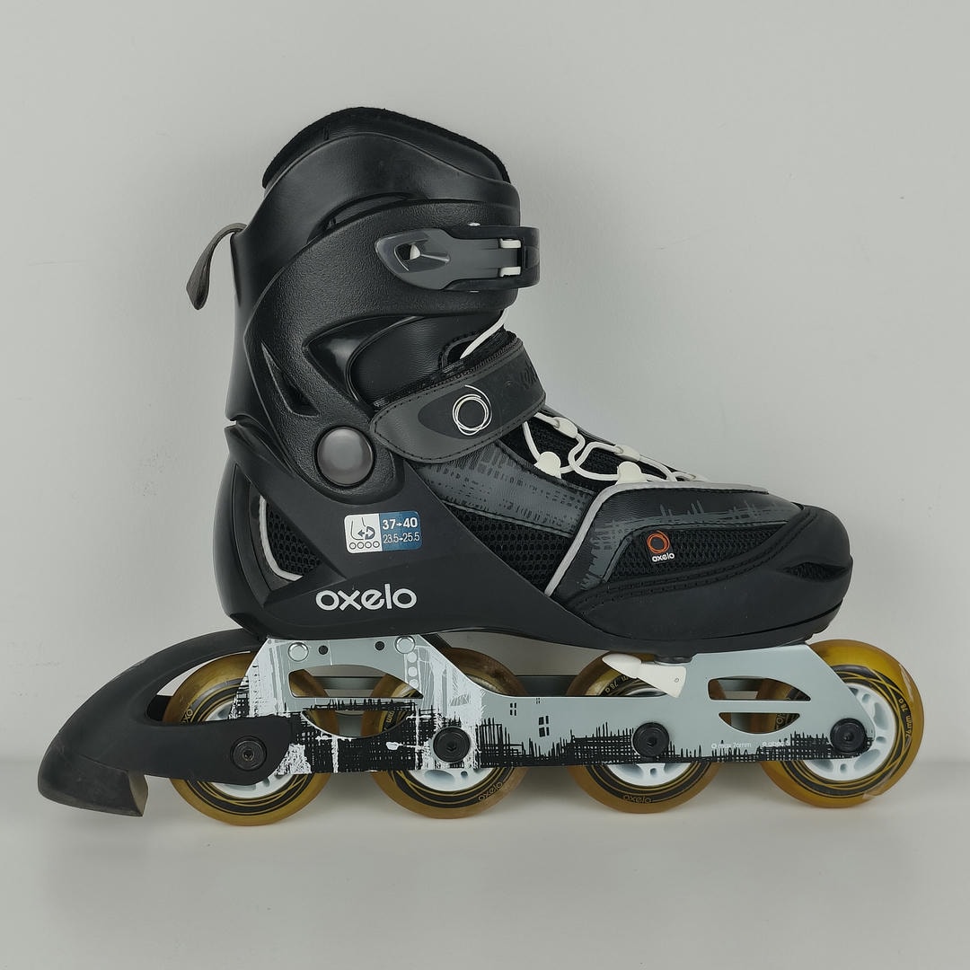 (37-40) Patins em linha ajustáveis Oxelo - Preto e branco