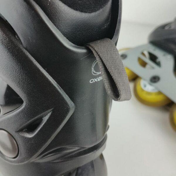 (37-40) Patins em linha ajustáveis Oxelo - Preto e branco