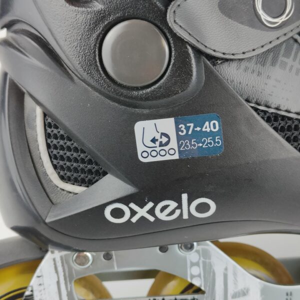 (37-40) Patins em linha ajustáveis Oxelo - Preto e branco