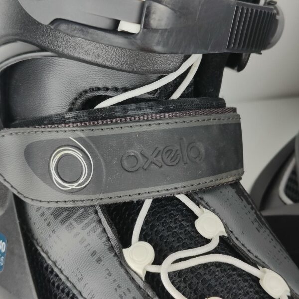 (37-40) Patins em linha ajustáveis Oxelo - Preto e branco