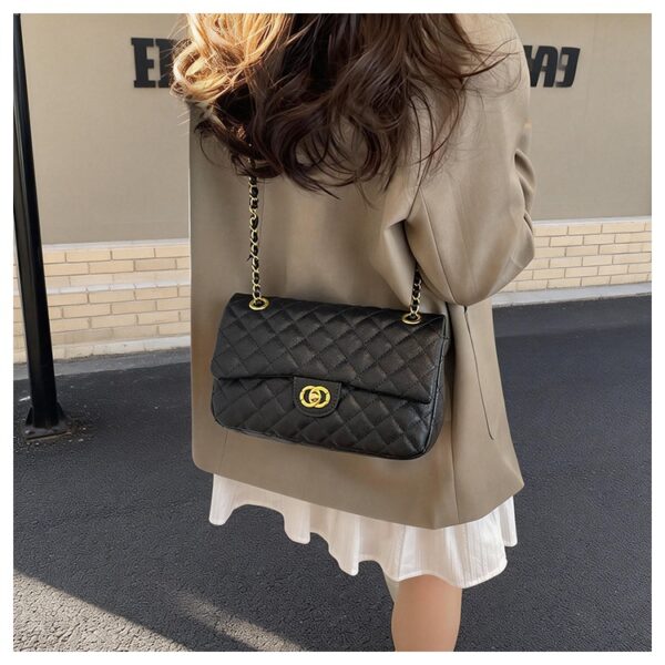 D226X3097_1775563048976_1 Mala a Tiracolo de Pele Estilo Parisiense Elegante e Clássica Mensageiro